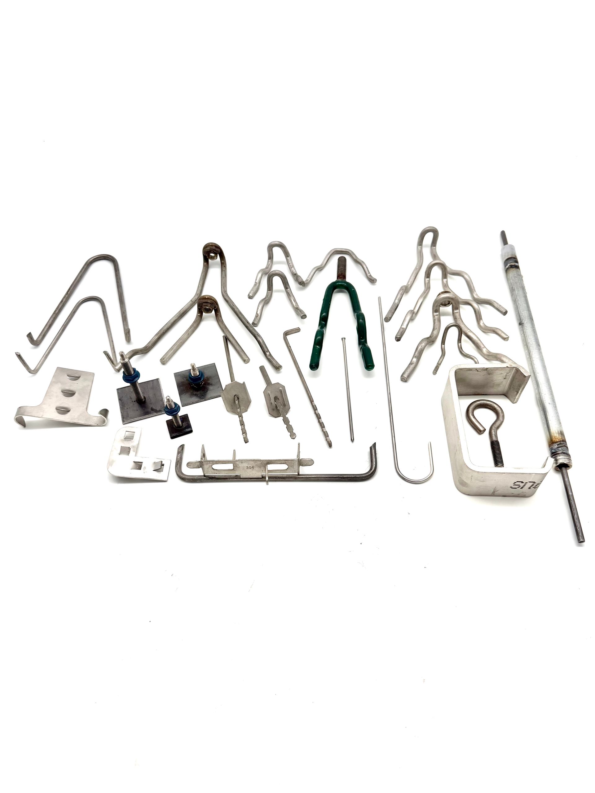 A close up of a bunch of metal pieces on a table.