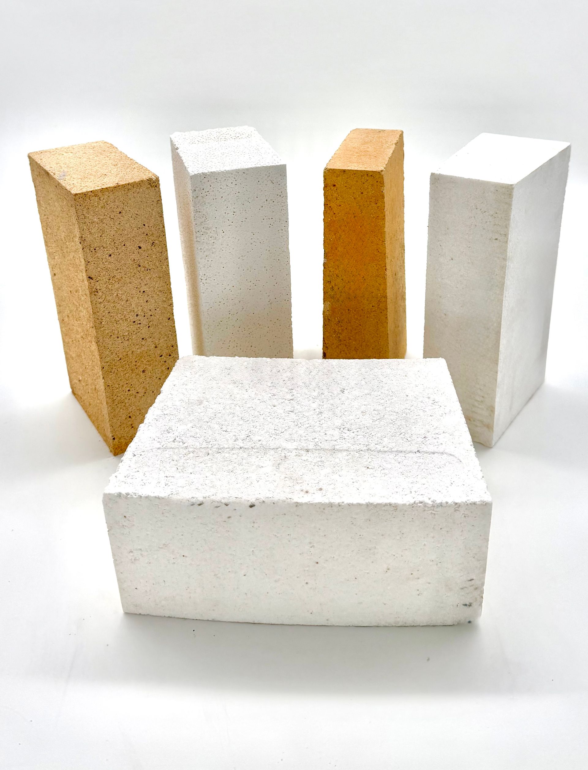 A row of boxes stacked on top of each other on wooden pallets.