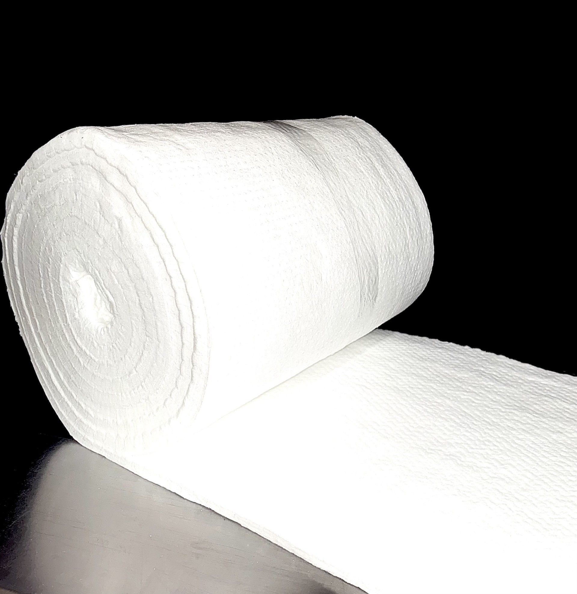 A roll of ceramic fiber blanket next to a box