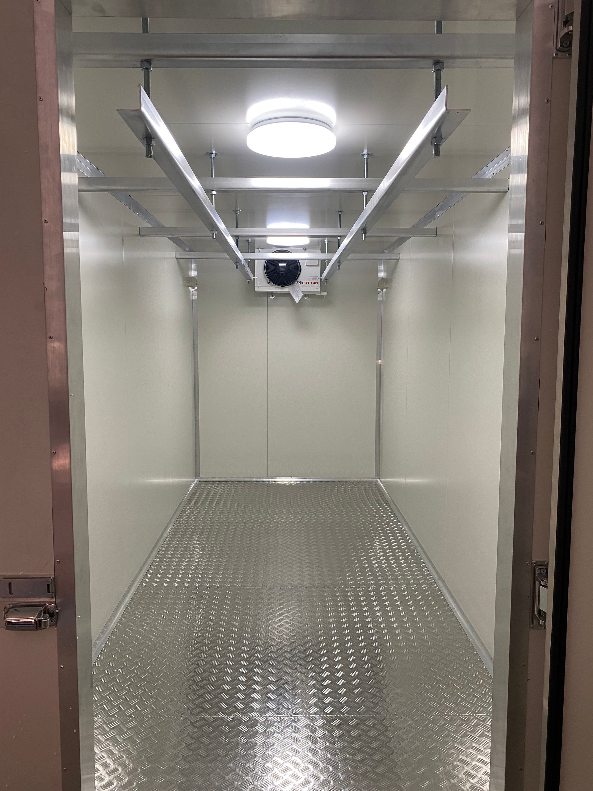 Meat rails for portable coolrooms