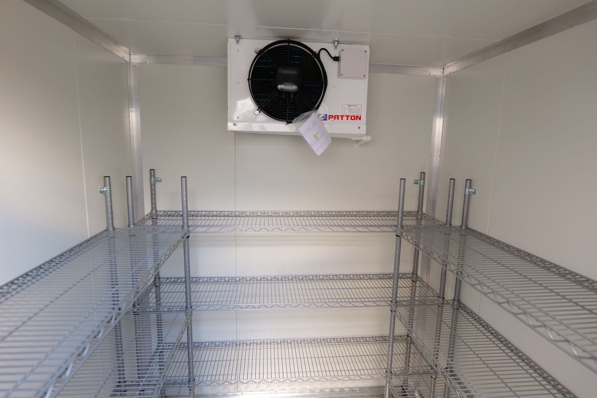 Shelving in portable coolrooms