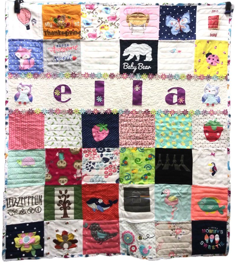 A beautiful quilt made from baby clothes