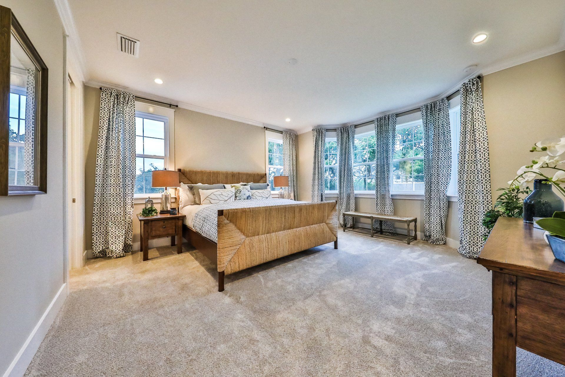 There is a large bed in the middle of the room.