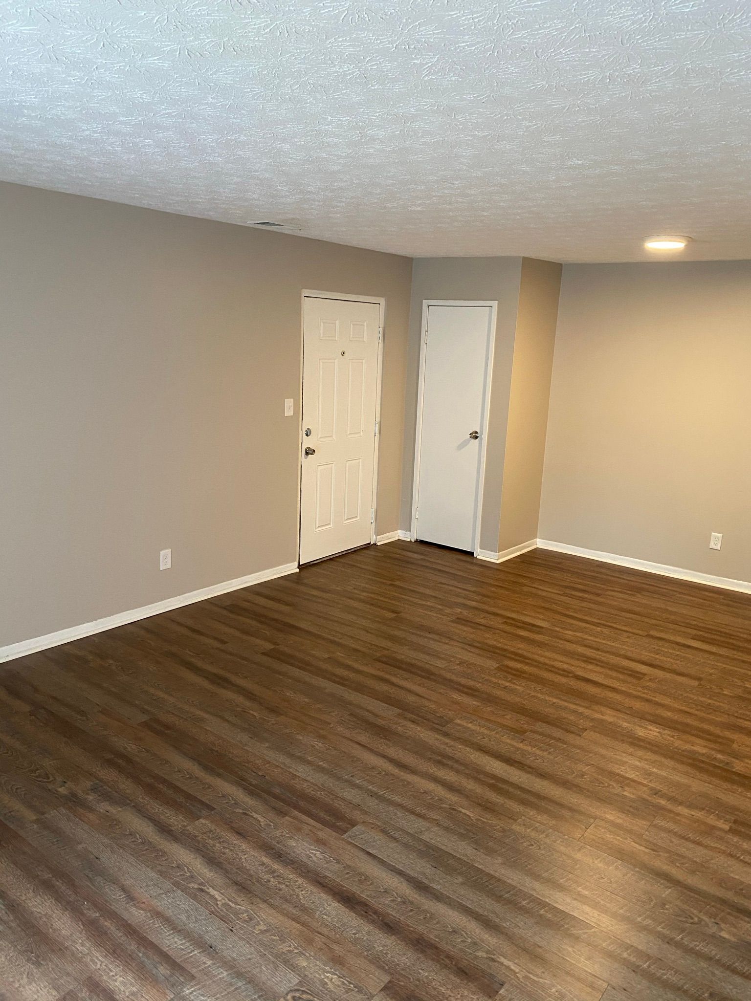 Yearling Court Apartments - Living room with hardwood floor