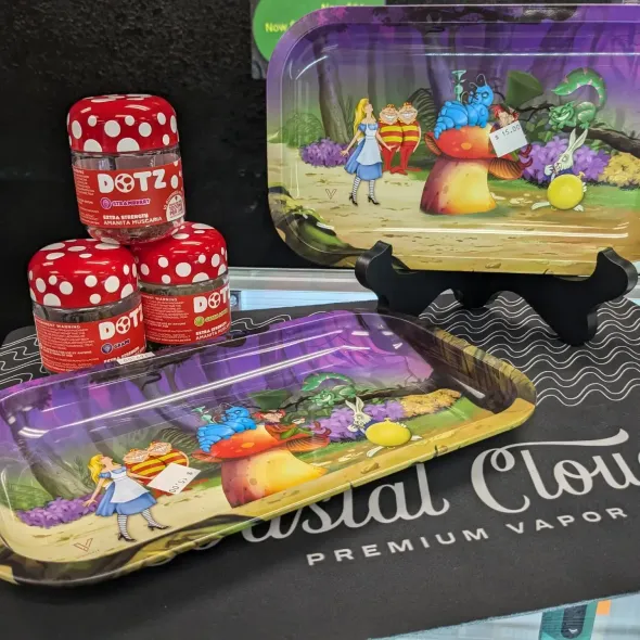 A tray with a picture of alice in wonderland on it