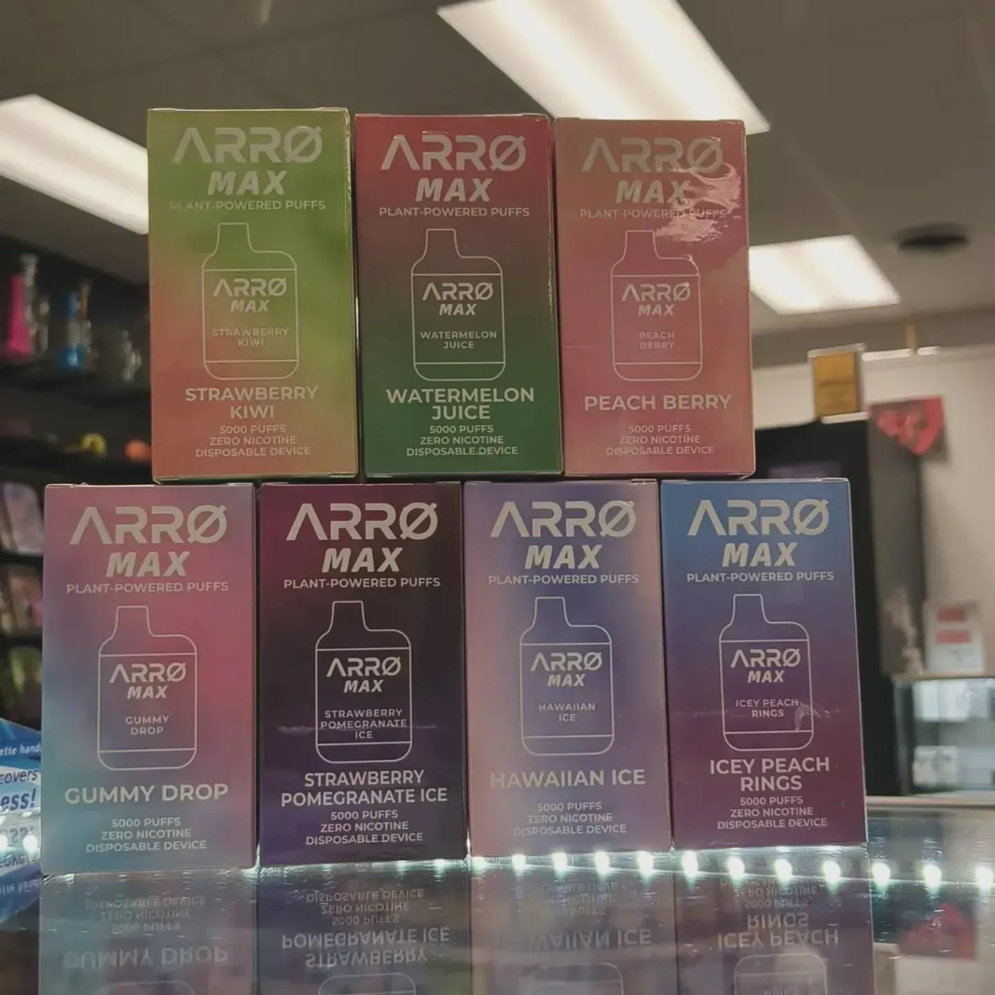 Several boxes of arro max are stacked on top of each other