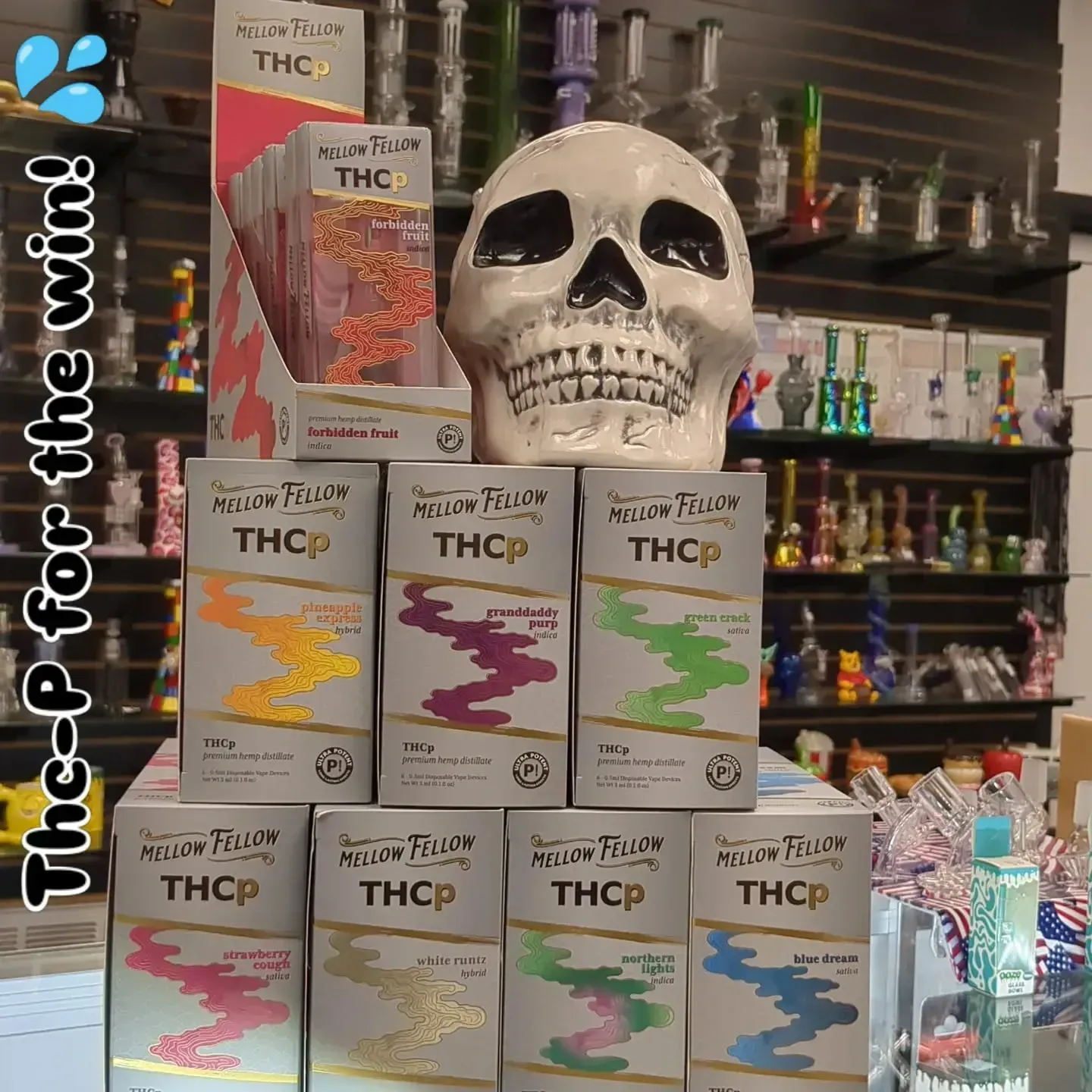 A skull is sitting on top of a stack of thcp boxes