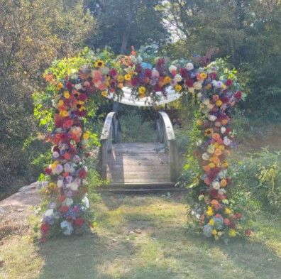 Tulips Floral Design | Westbrook, CT colorful flower arch