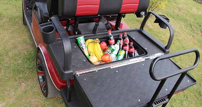Golf cart trunk with drinks ang fruits