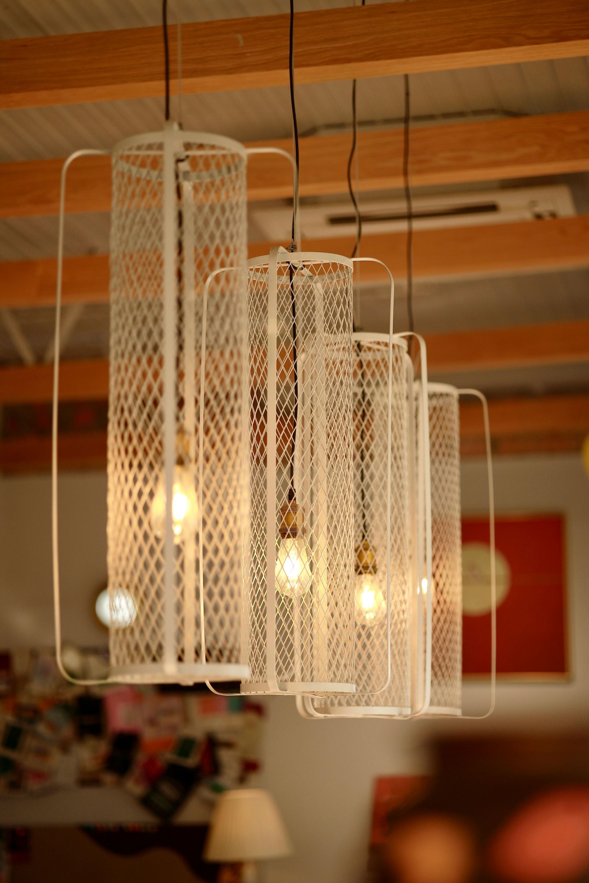 A bunch of lights hanging from the ceiling in a room