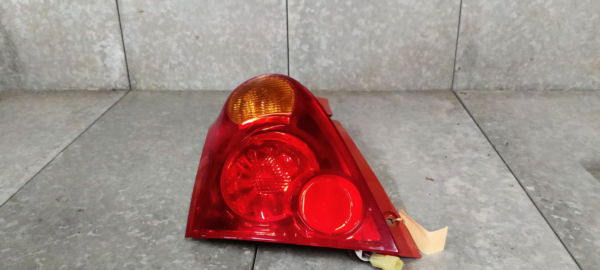 Suzuki Swift achterlicht links.