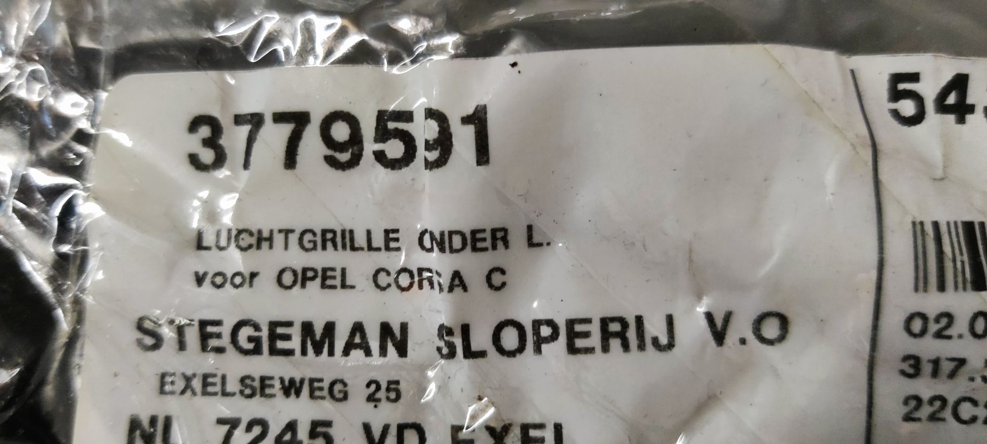 Opel Corsa C grille gedeelte linksonder.
