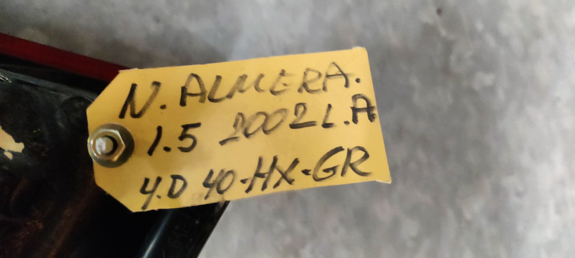 Nissan Almera linker achterlicht bj 2002.