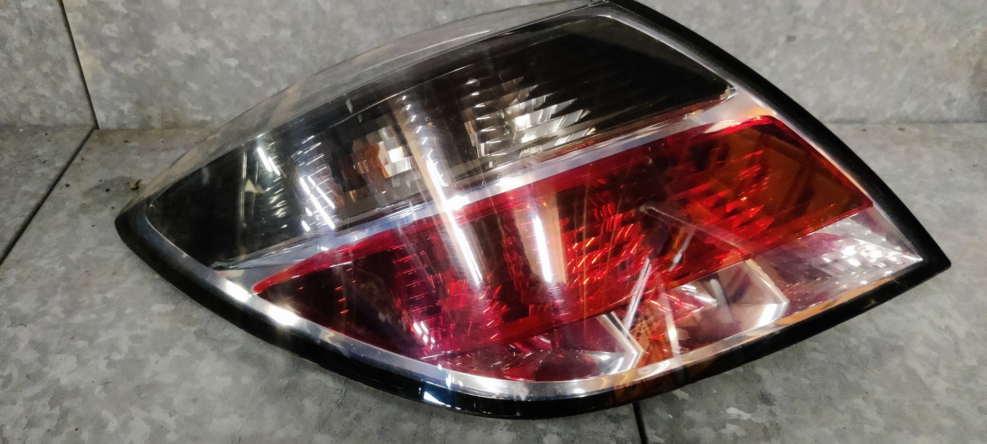 Opel Astra H 1.6 GTC  achterlicht links.