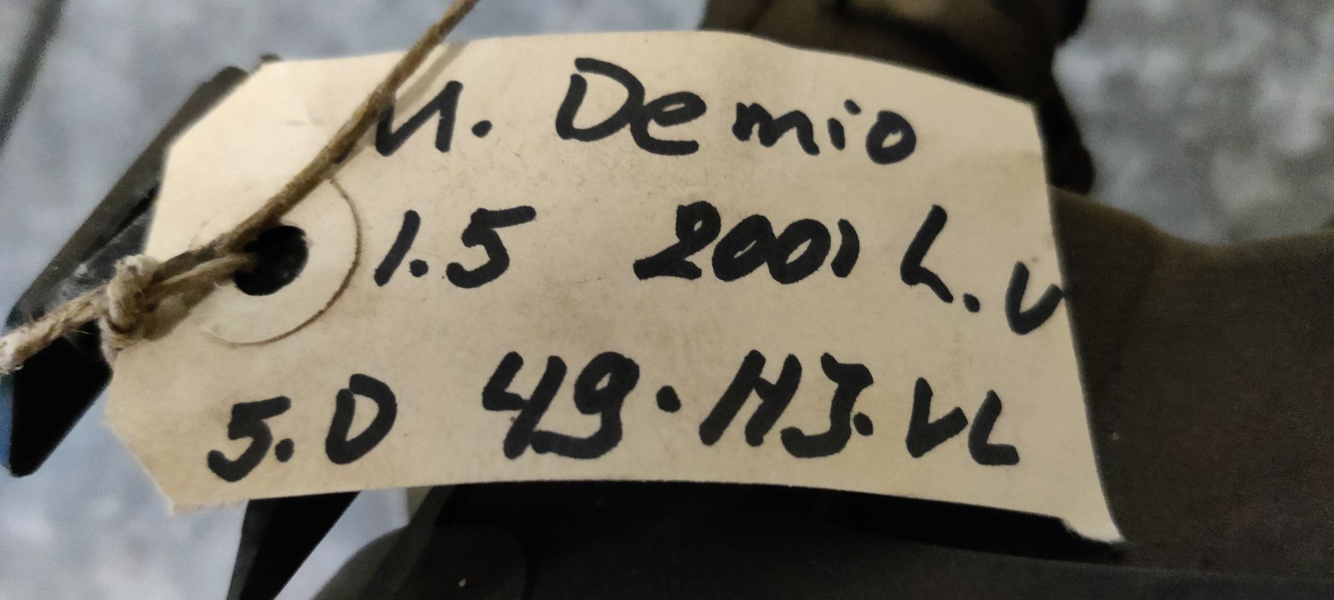 Mazda Demio linker koplamp uit 2001.