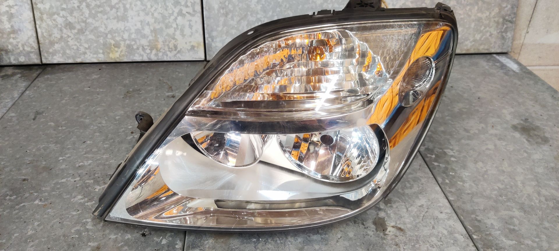 Renault Scenic linker koplamp uit 2003.