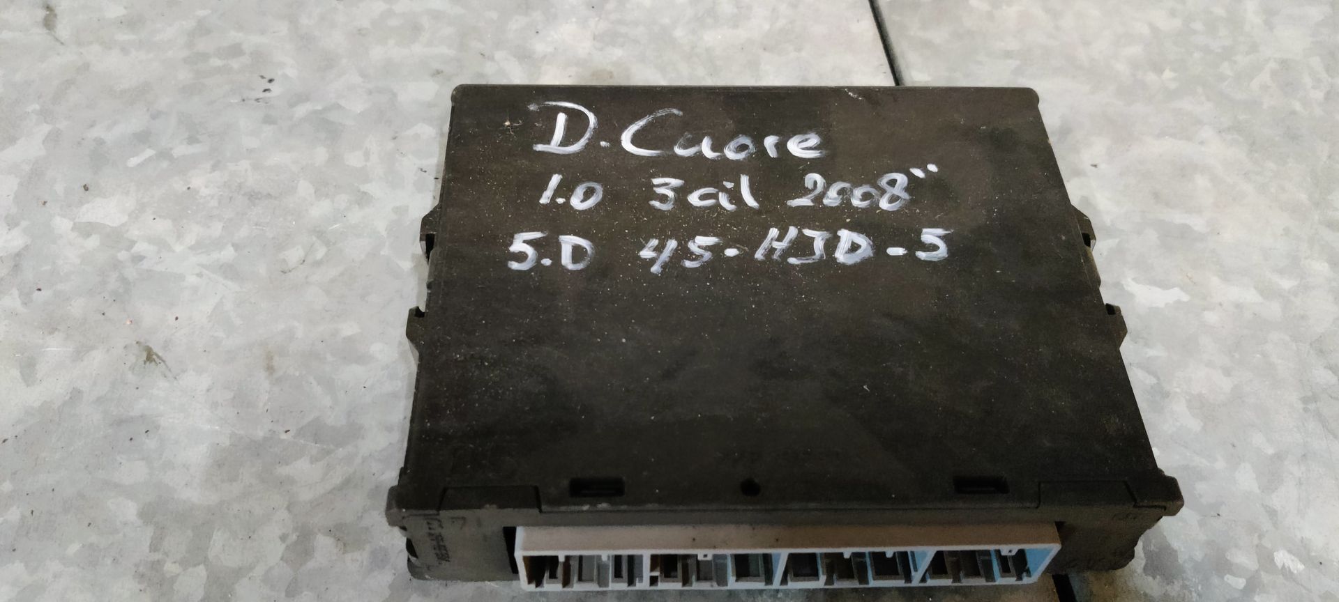 Daihatsu Cuore computer tbv contactslot uit 2008.