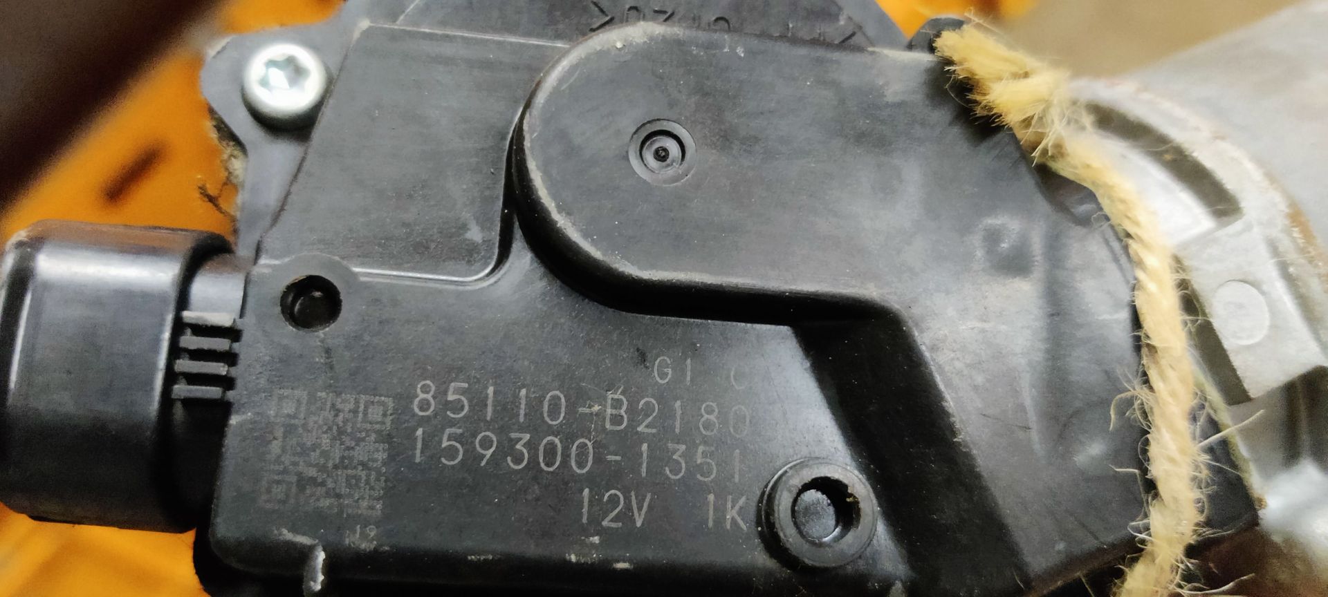 Daihatsu Cuore ruitenwissermotor voor uit 2008.