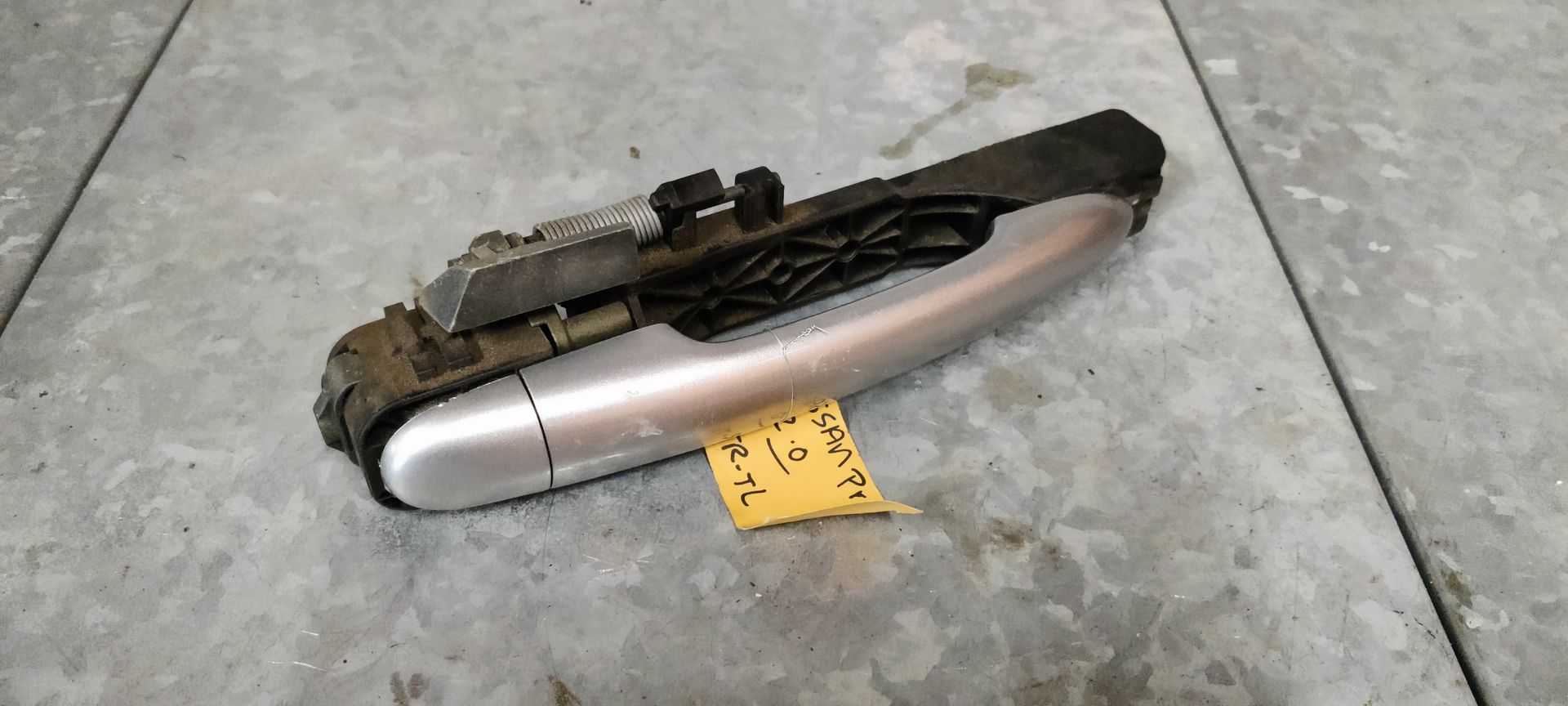 Nissan Primera rechtsvoor deurhendel 2007.