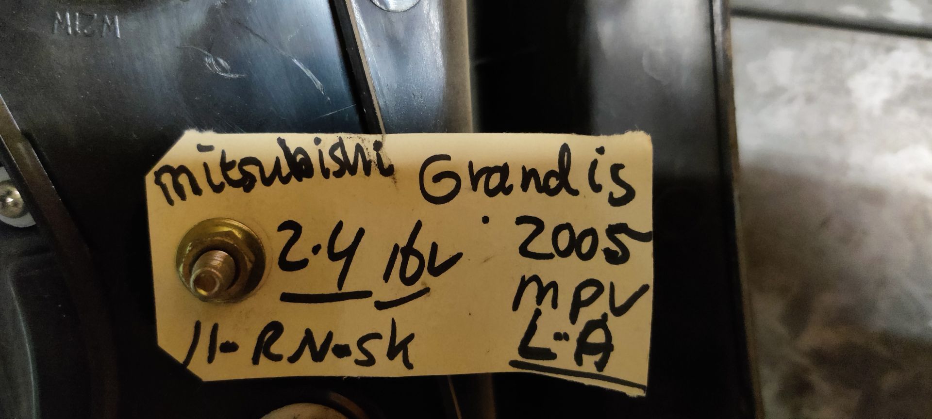 Mitsubishi Grandis linker achterlicht uit 2005.