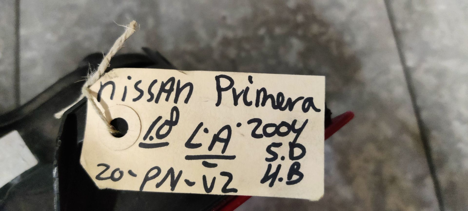 Nissan Primera  linker achterlicht uit 2004.