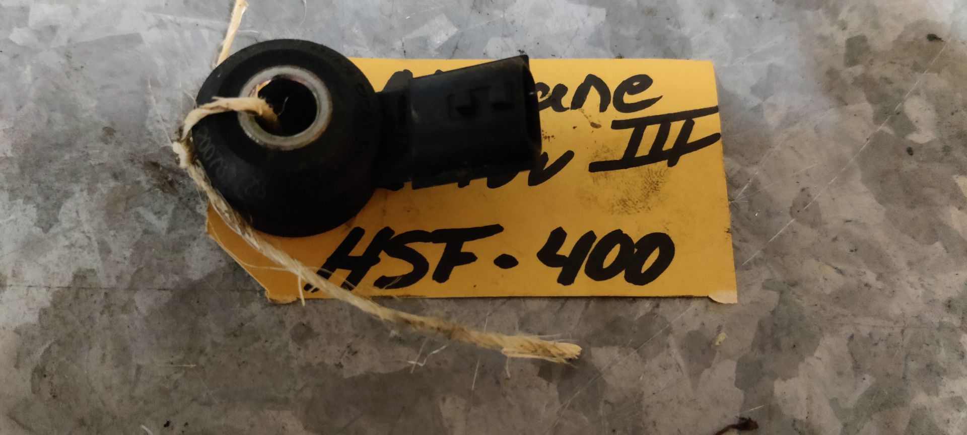 Motorsensor van een Megane 3 uit 2012.