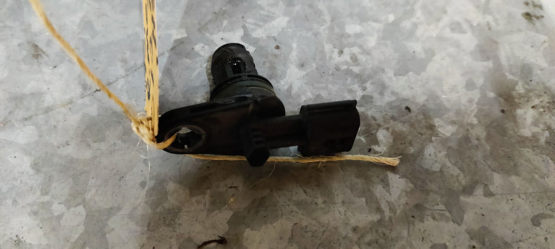 Motorsensor van een Megane 3 uit 2012.