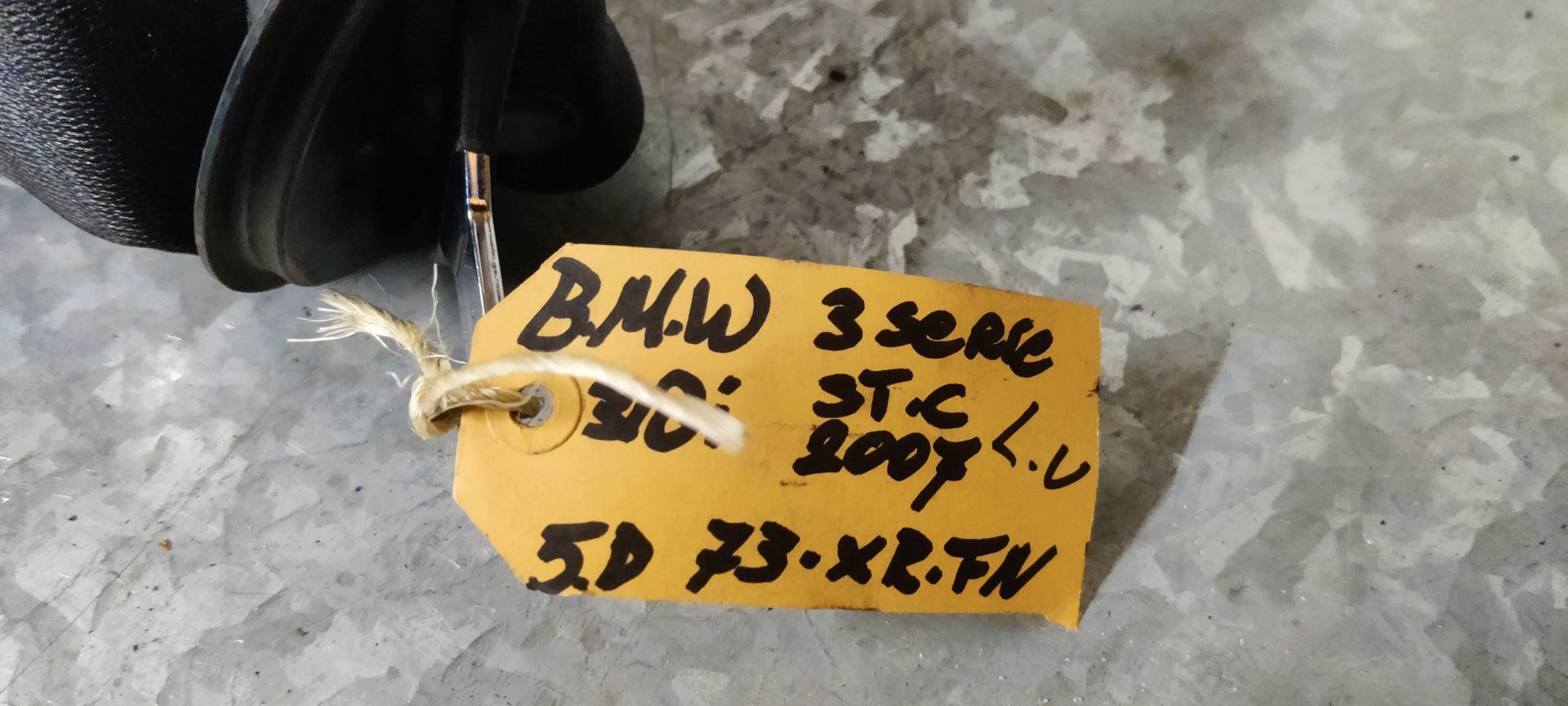 BMW 318i (E91) rolgordel linksvoor 2007.