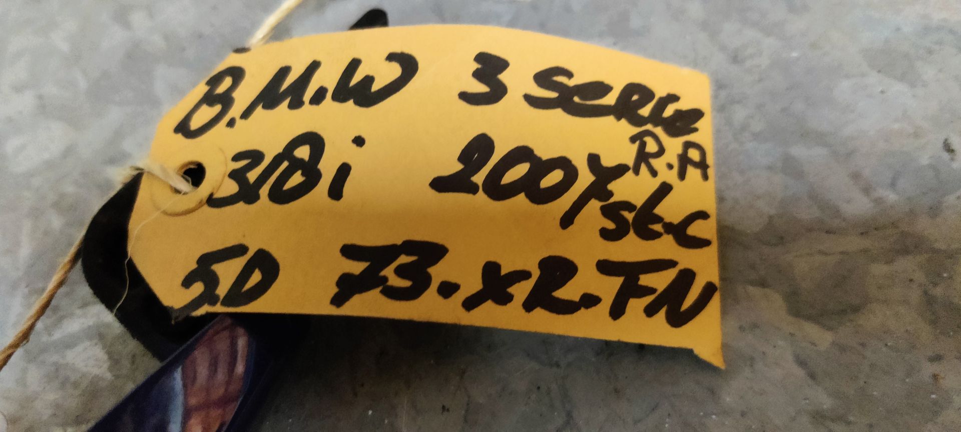 BMW 318i (E91) deurhendel buitenzijde rechter achterportier uit 2007.