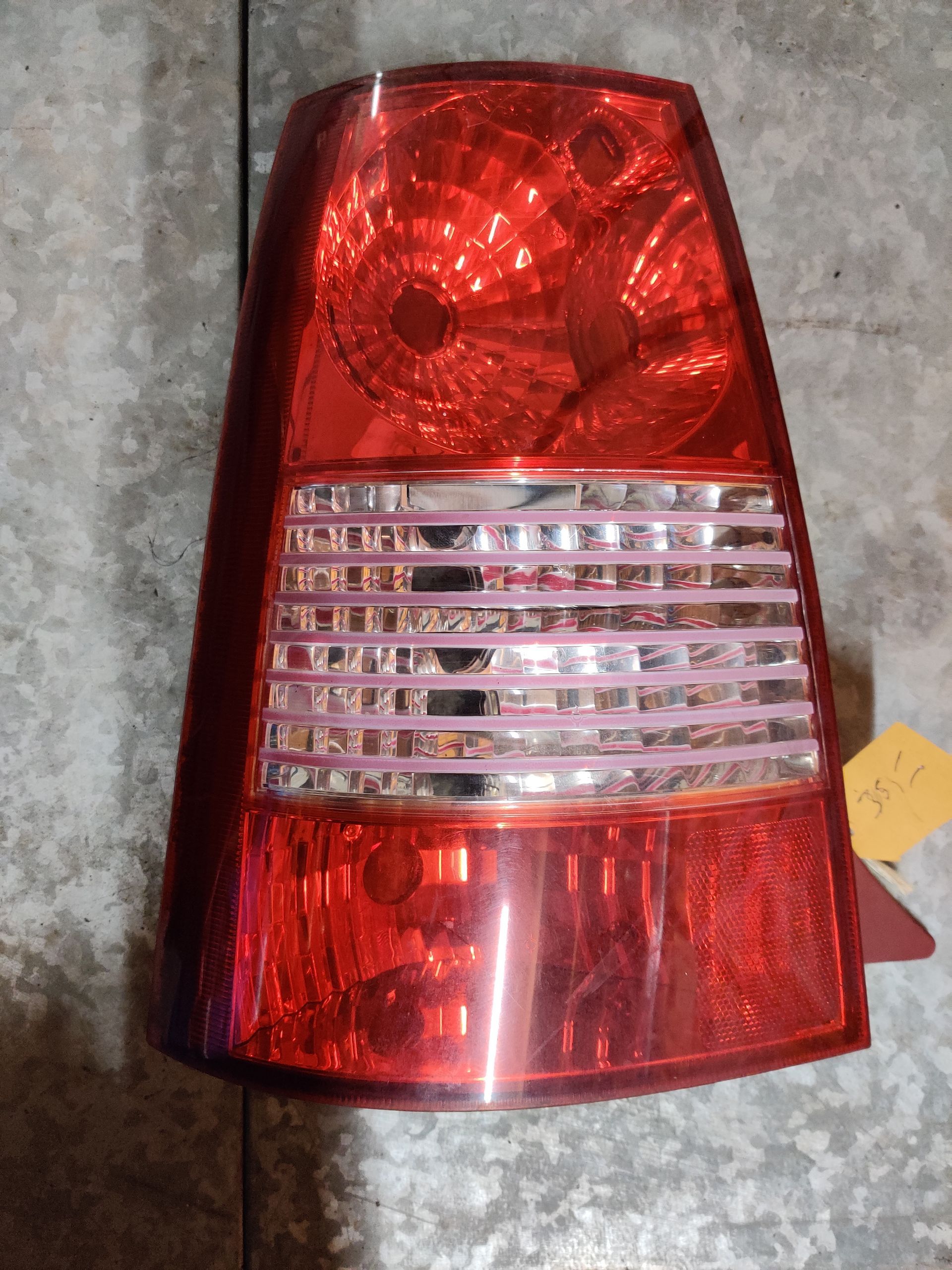 Kia Picanto linker achterlicht uit 2007.