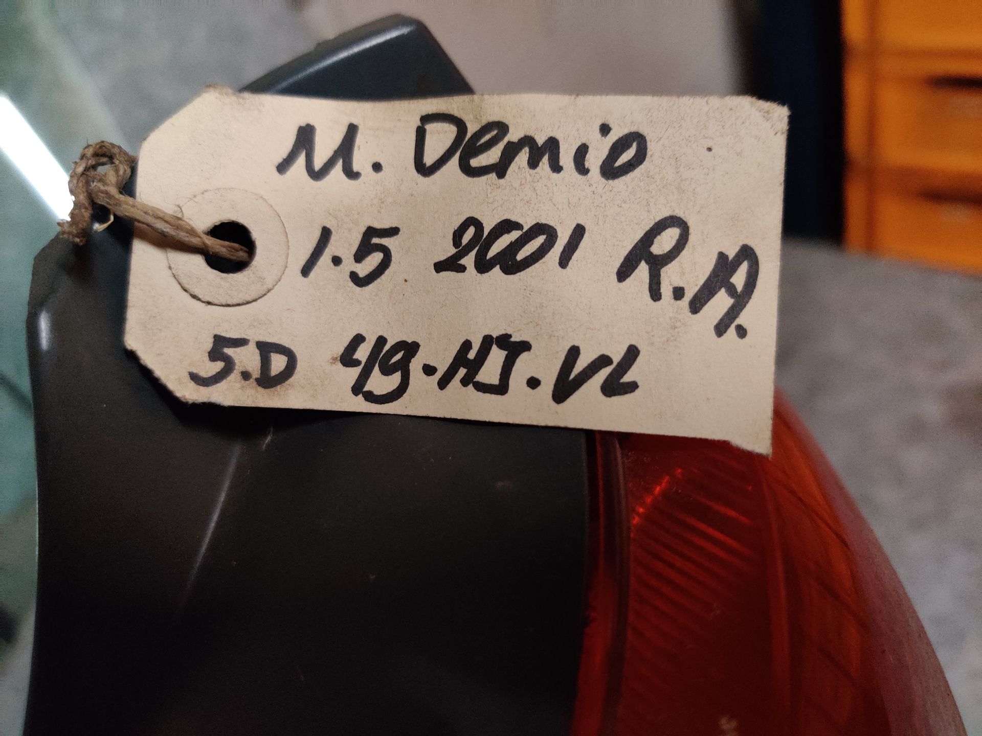 Mazda Demio rechter achterlicht uit 2001.