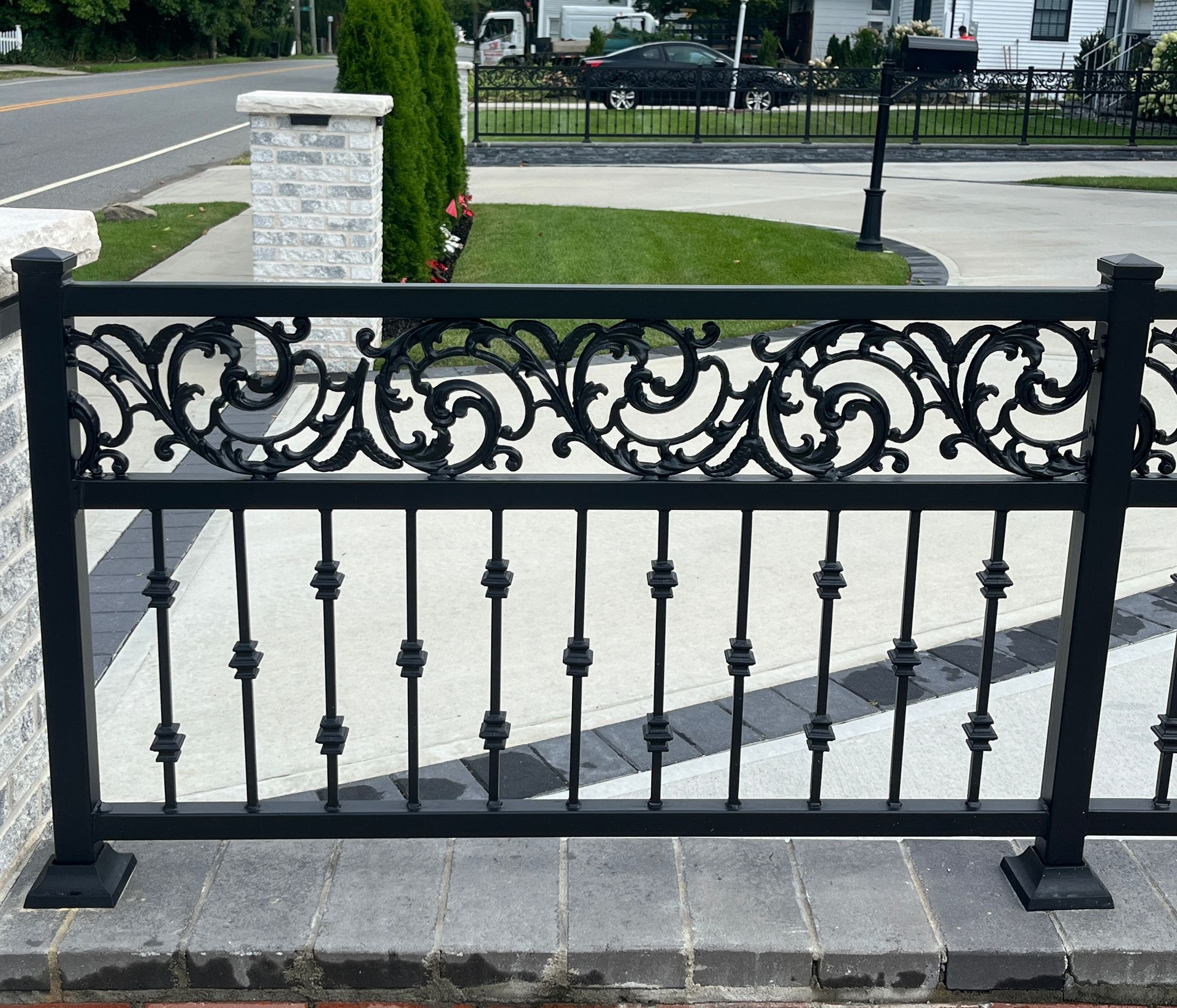 Black wrought iron railing on a terrace Black wrought iron railing on a terrace