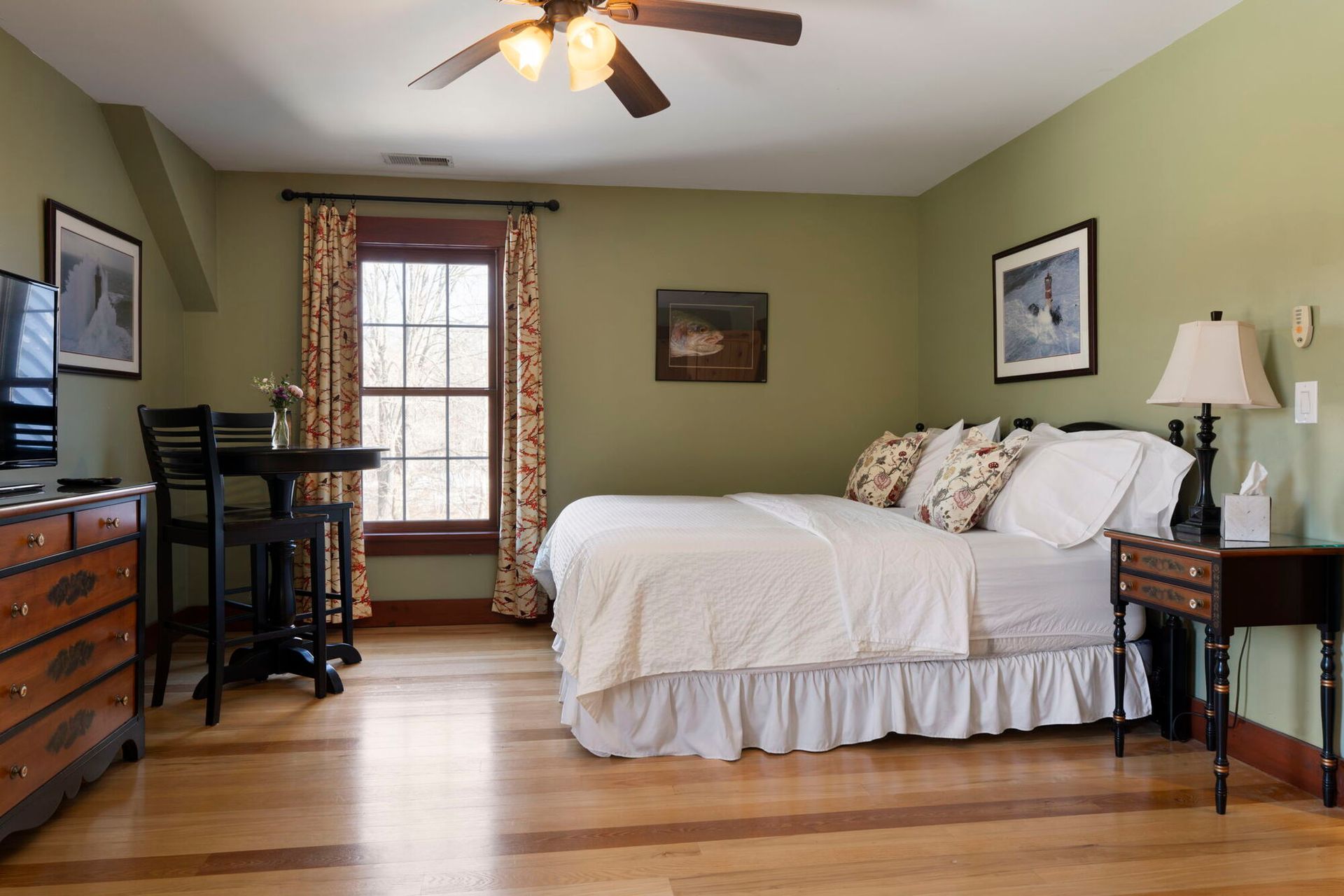 A sunset over a mountain range with a lot of fog