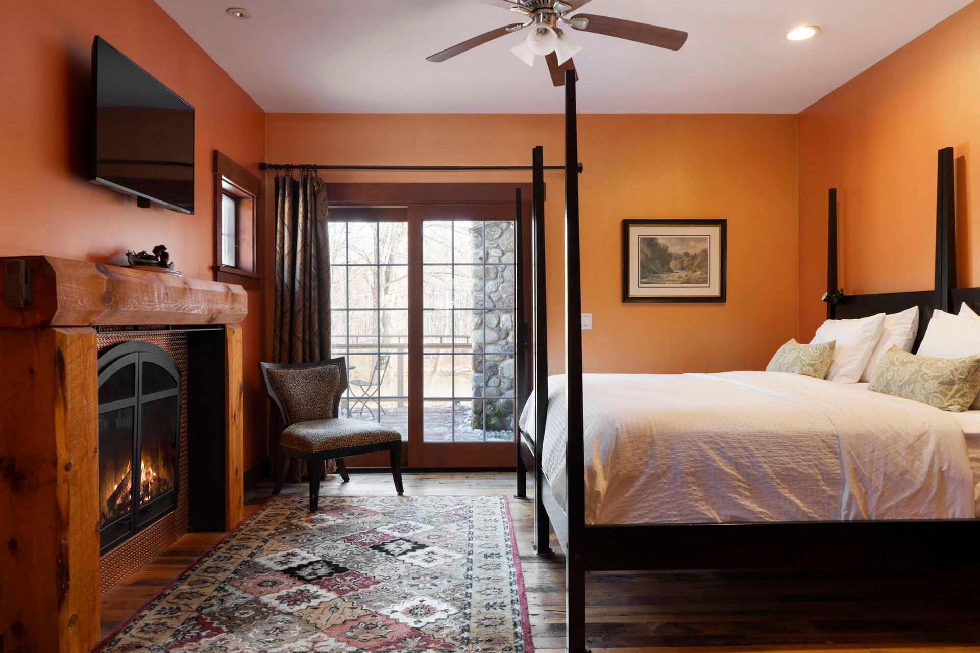 A sunset over a mountain range with a lot of fog