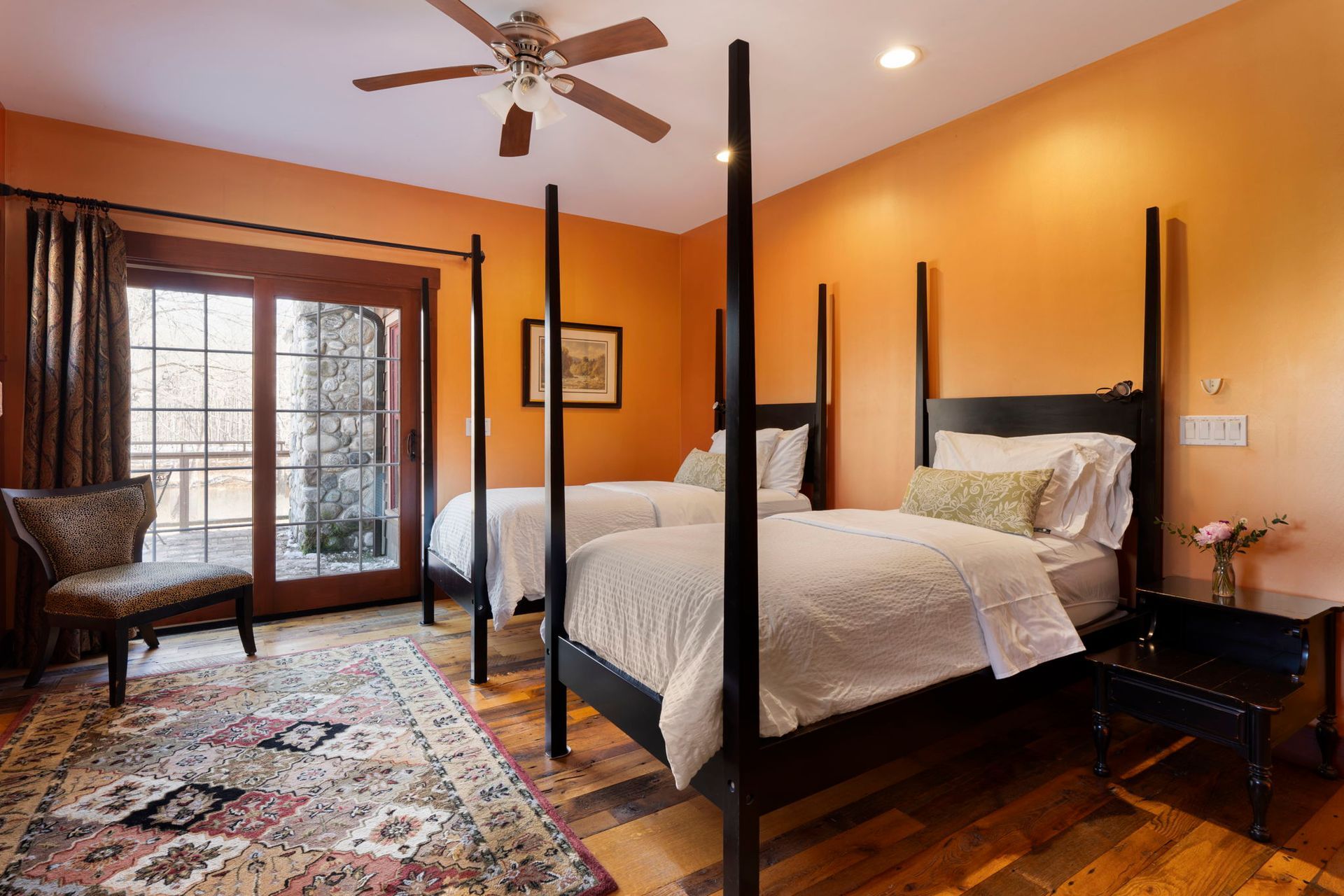 A sunset over a mountain range with a lot of fog