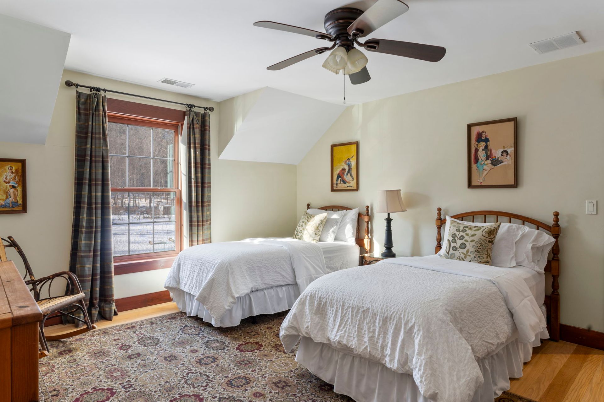 A sunset over a mountain range with a lot of fog