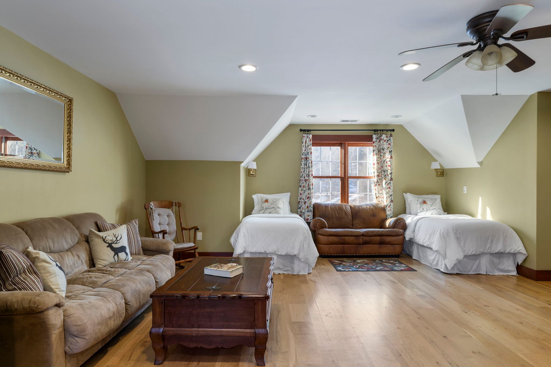 A sunset over a mountain range with a lot of fog