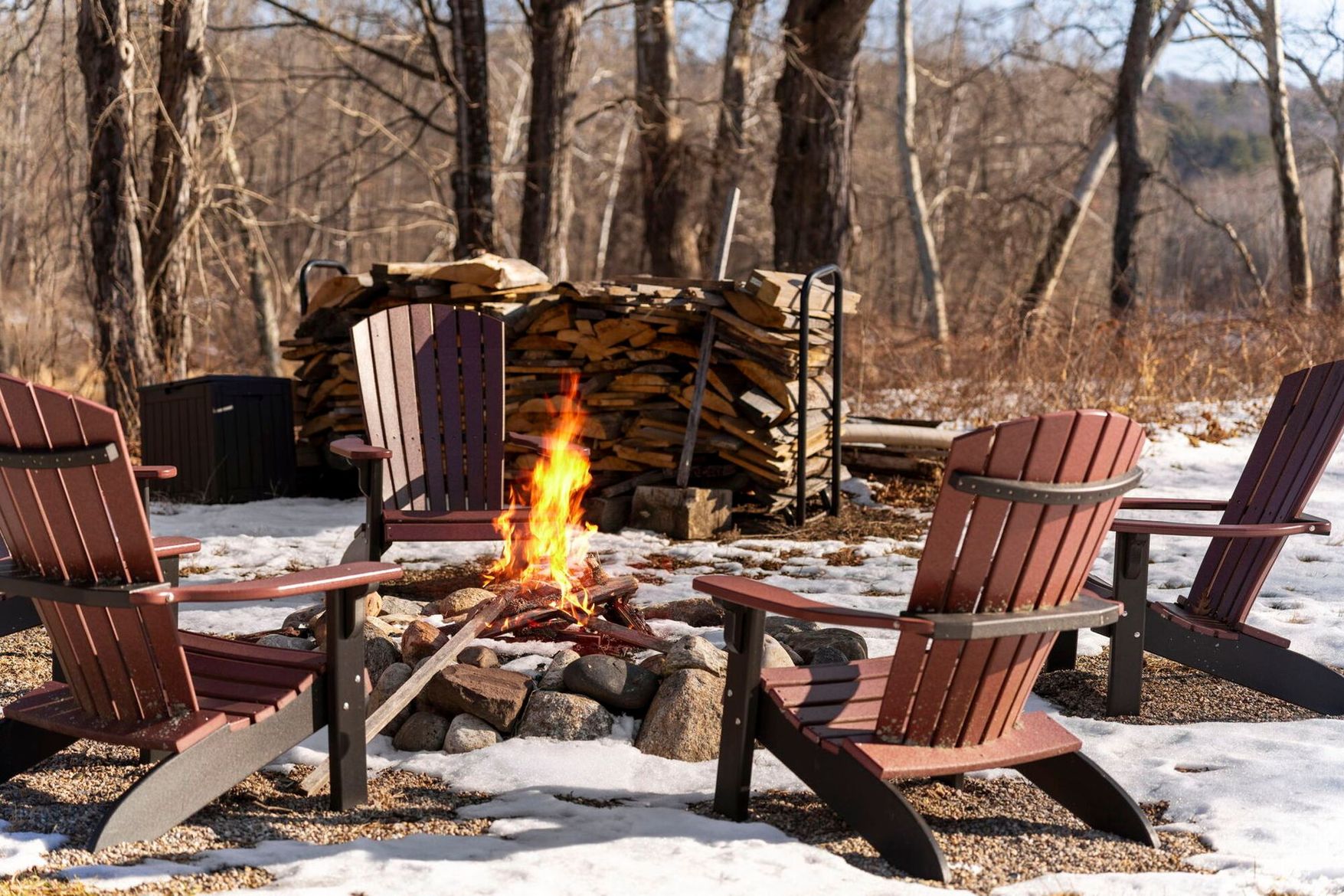 A sunset over a mountain range with a lot of fog