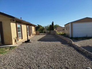 After Grass Removal Between Two Houses — Alamogordo, NM — David's Landscaping Design LLC
