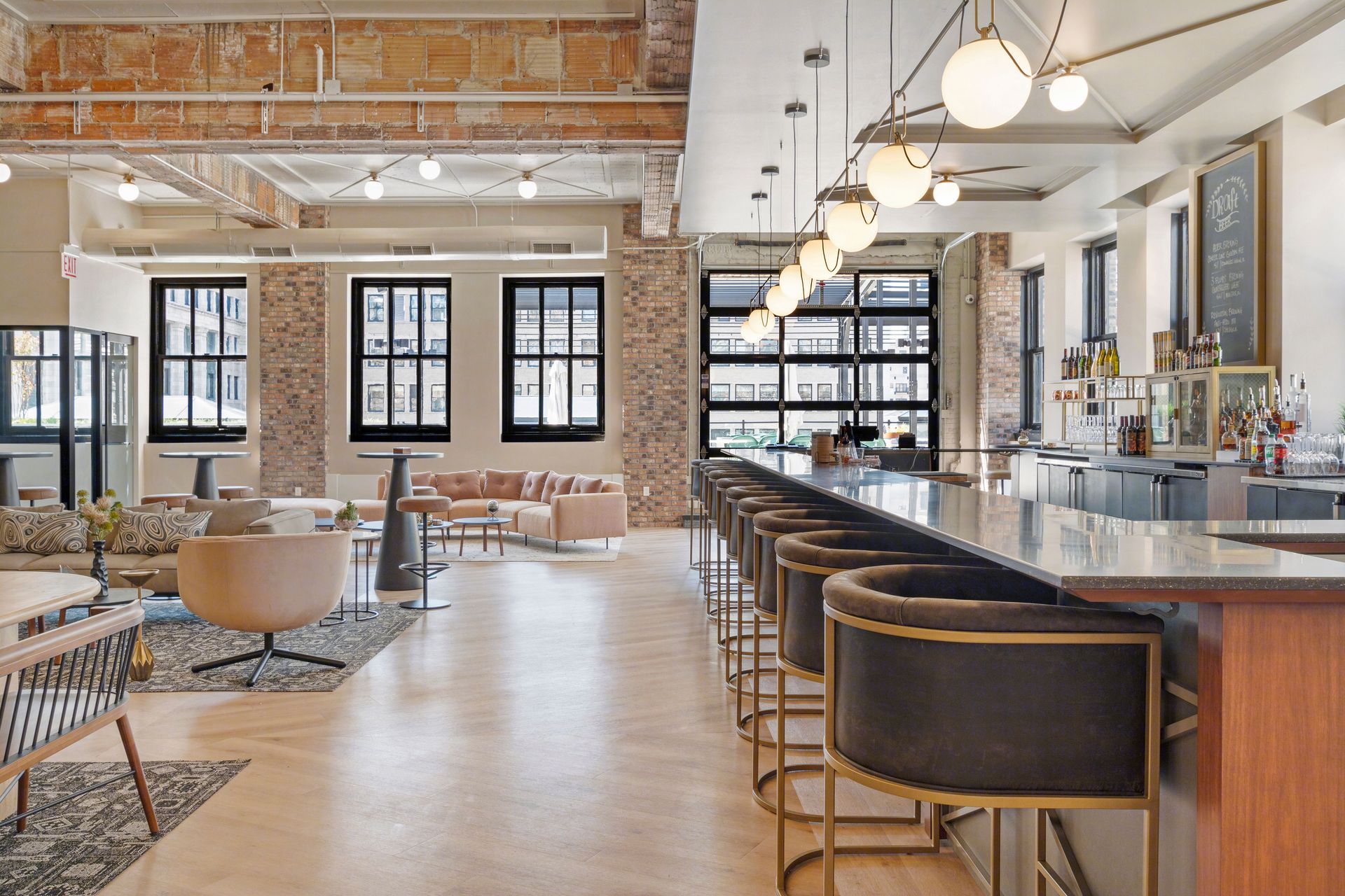 There is a long bar in the middle of the room.