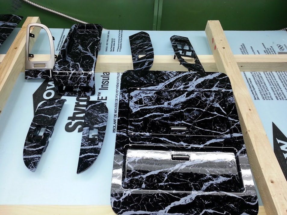 A piece of styrofoam with a black and white marble pattern on it