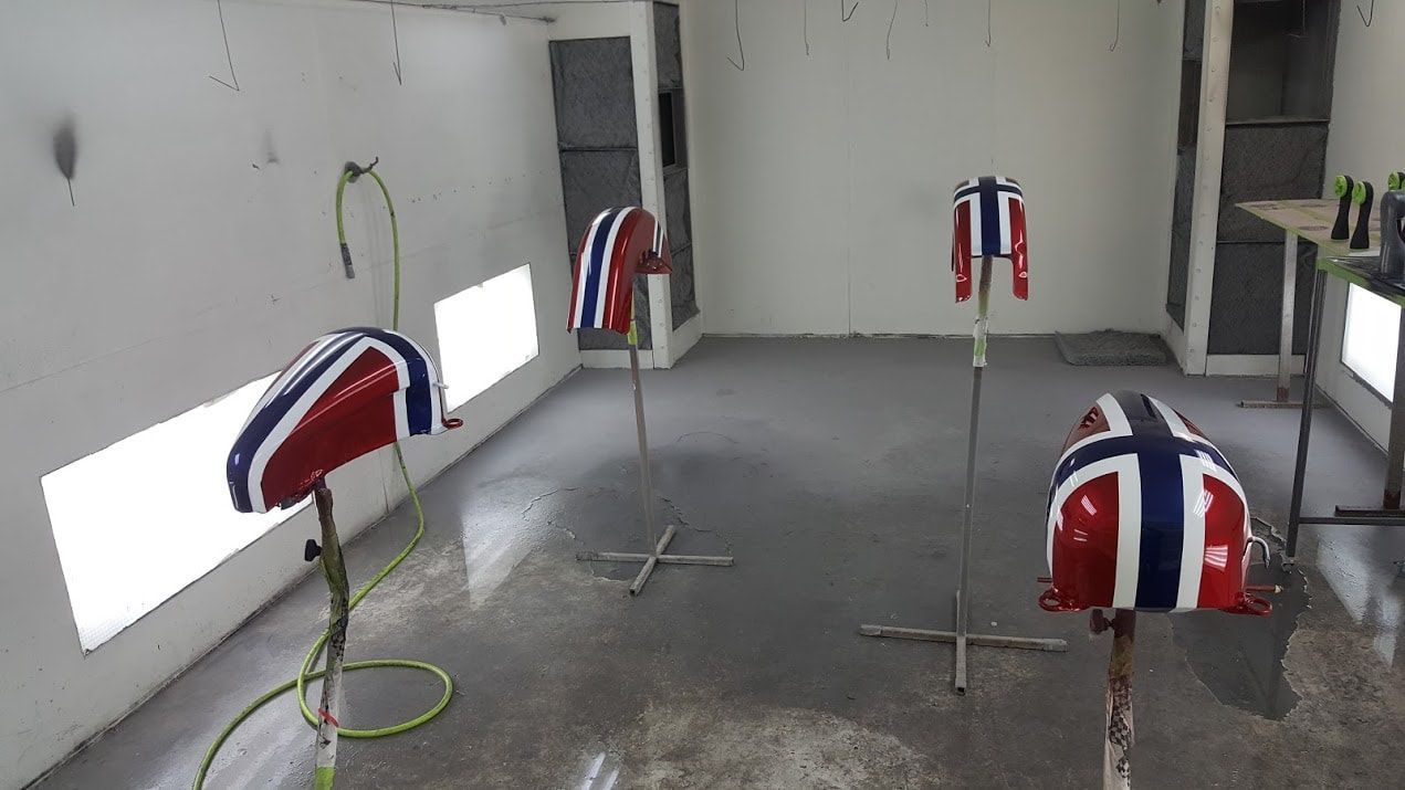 A room with a lot of flags on the floor