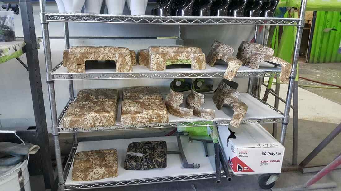 A shelf filled with lots of different types of animals.