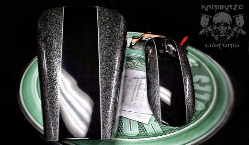 A green plate with a picture of a skull on it