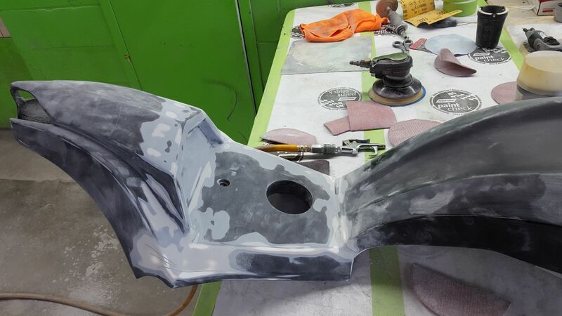 A piece of metal is sitting on top of a table.