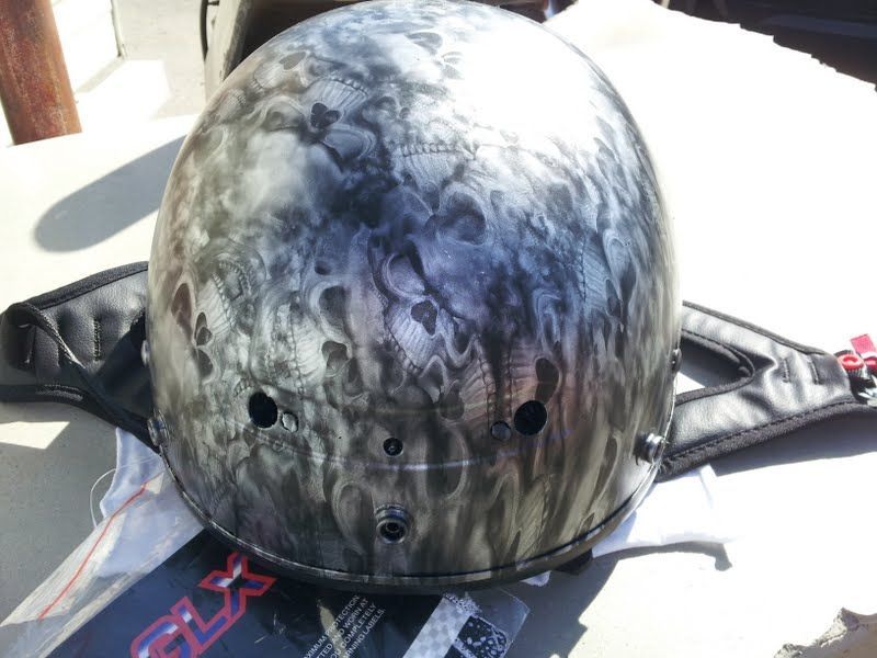 A motorcycle helmet with flames painted on it