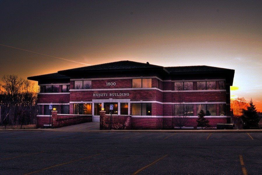 A large brick building with the number 1452 on it