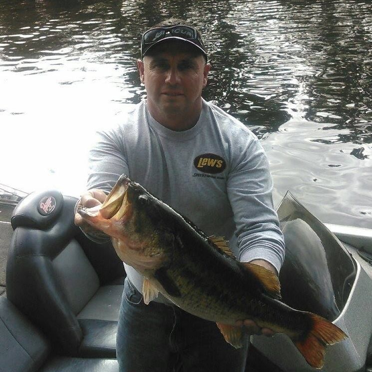 Man Holding A Big Fish — Lake Tarpon, FL — Captain Lenny Crispino's Guide Service