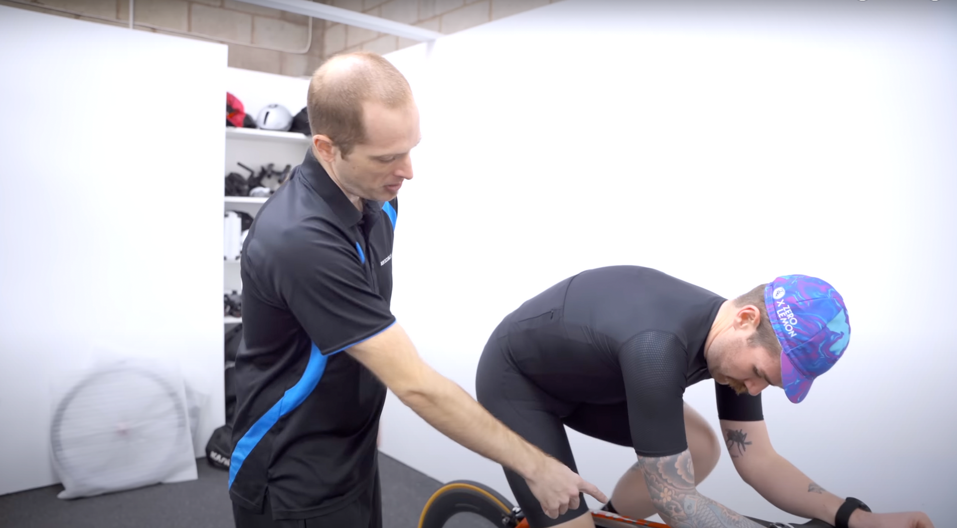 Dr Xavier Disley of AeroCoach & Chris Hall are performing a road bike fit at AeroCoach HQ