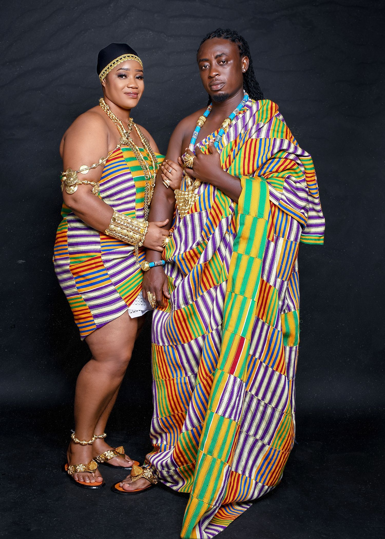 A man and a woman are posing for a picture together